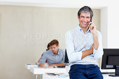 Buy stock photo Business man, portrait and phone call at desk with management networking and confidence of mentor. Mockup, happy and mature journalist at newspaper publisher company with mobile interview for story