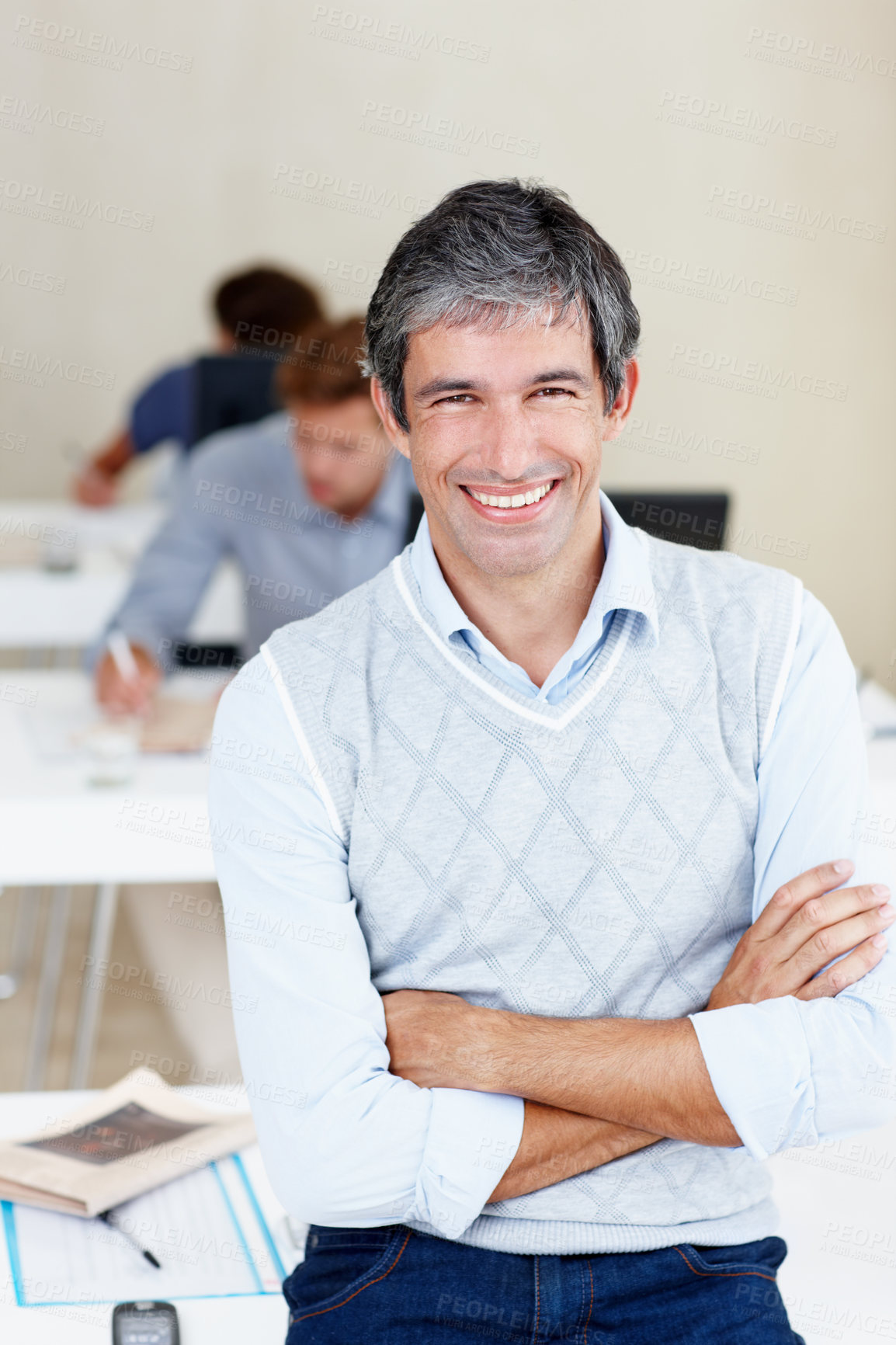 Buy stock photo Mature man, lecturer and arms crossed in classroom with university student for assessment, test and exams. Male person, teacher and happy on portrait with confidence for college education and career