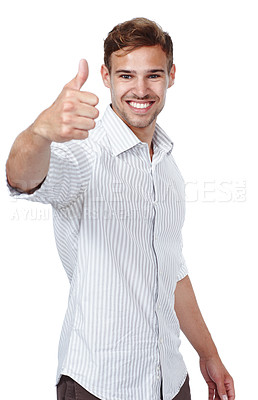 Buy stock photo Portrait of man showing thumbs up sign and gesture while isolated against a white background in studio with copyspace. One handsome young model posing, smiling and endorsing trust with hand gesture