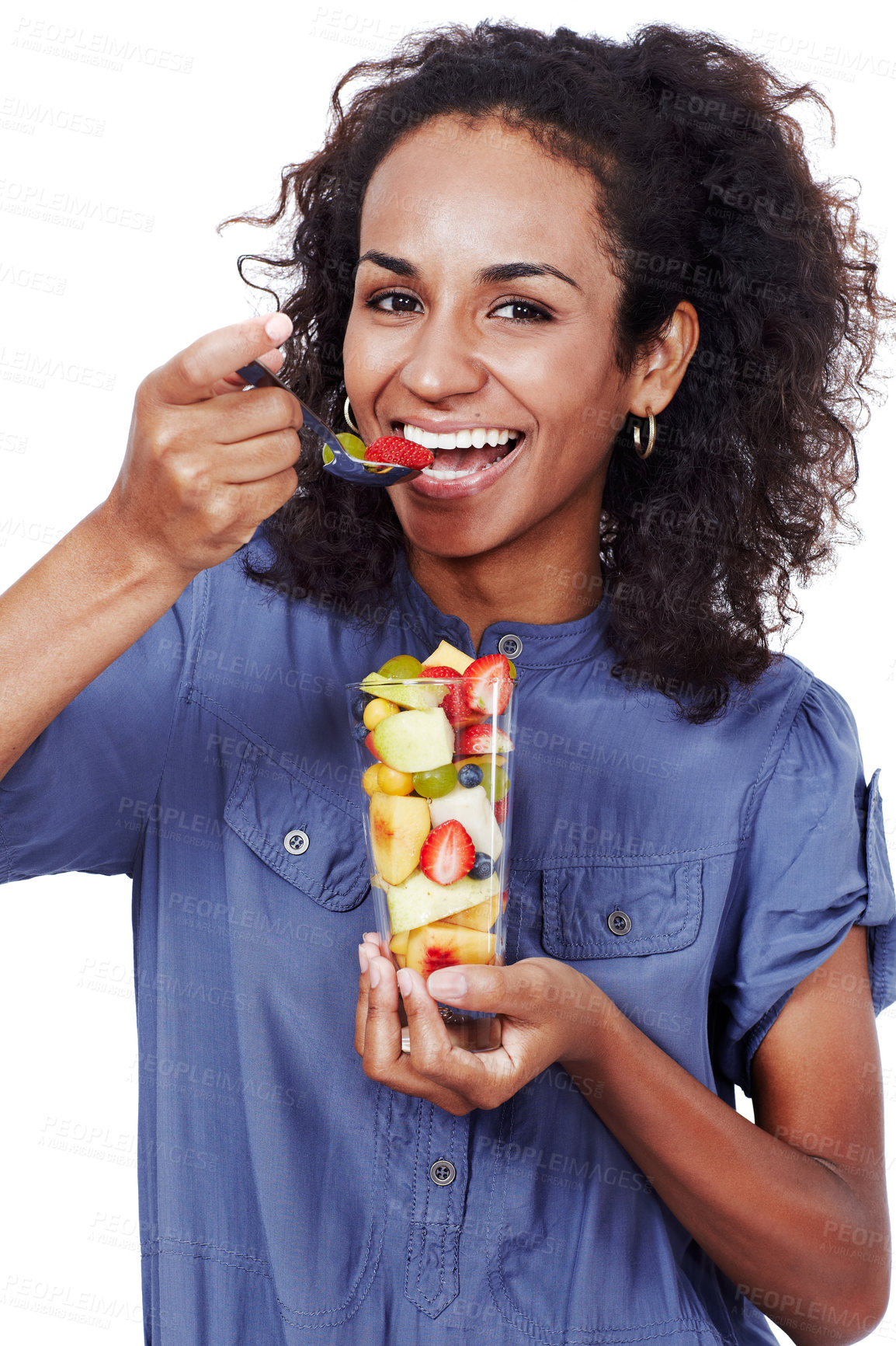 Buy stock photo African woman, portrait and eating fruit salad in studio with smile, healthy breakfast and vitamins for energy. Benefits, white background and model with organic food for wellness and diet nutrition