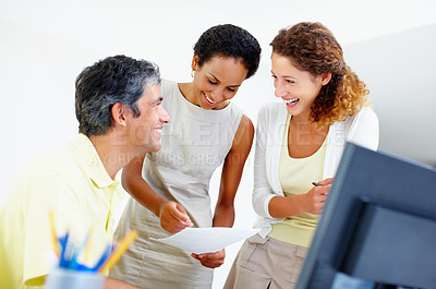 Buy stock photo Happy business people smiling and looking at each other with woman holding paperwork