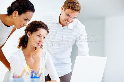 Buy stock photo Laptop, smile and thinking with business people in office together for programming or web development. Computer, meeting and problem solving with developer team in creative workplace for planning