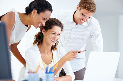 Buy stock photo Laptop, pointing and smile with employee people in office together for programming or web development. Computer, meeting and teamwork with happy developer group in creative workplace for planning