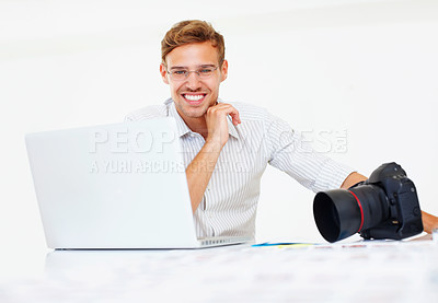 Buy stock photo Happy, man and photographer with portrait in workplace, camera or laptop with catalog for research trend topic. Male visual artist, creative agency and online for project management and editing photo