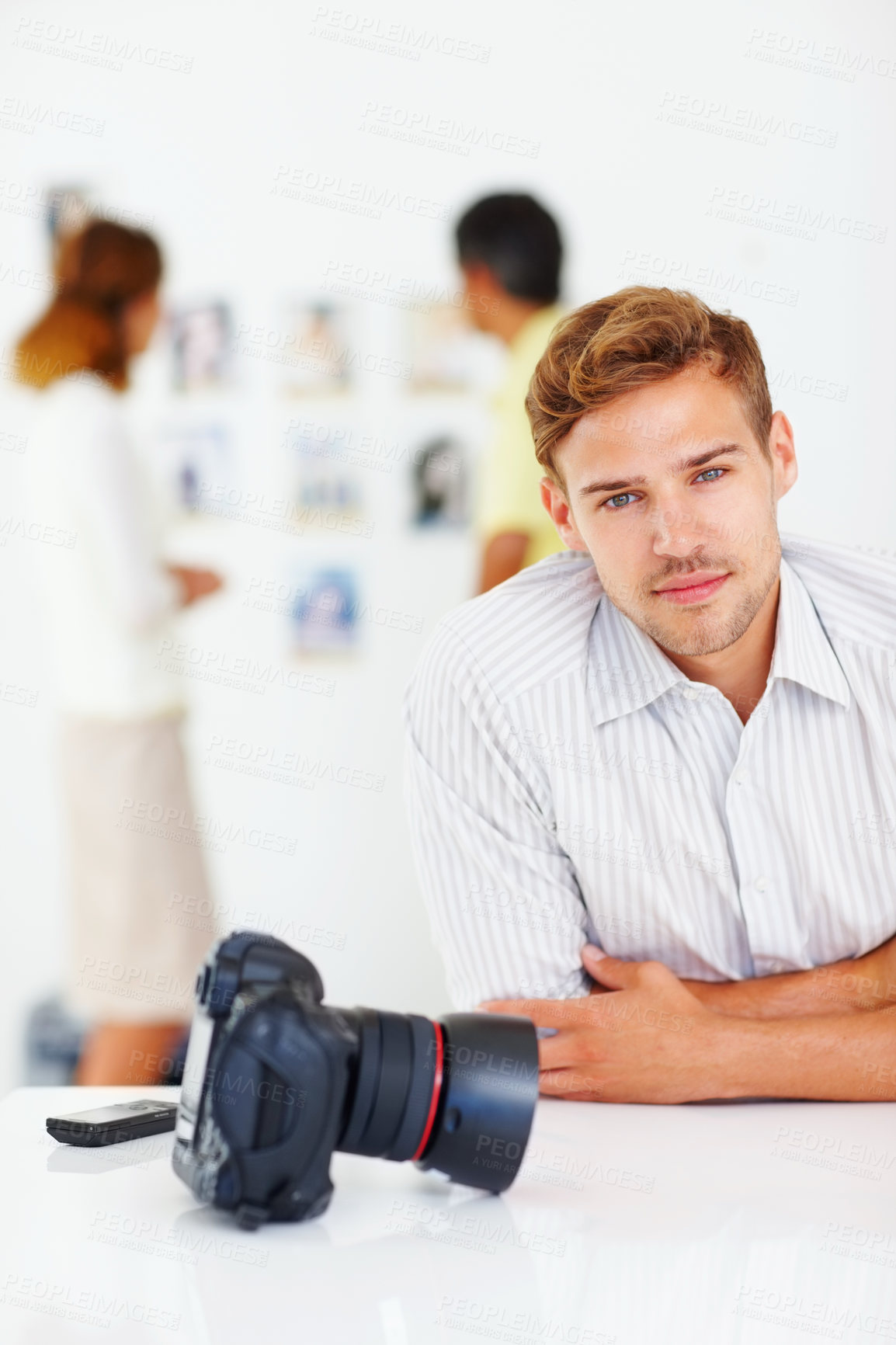 Buy stock photo Portrait, photographer and man with smile in office, confident and journalist with ambition in business. Proud, reporter and excited for internship in newsroom, happy and storytelling of person