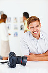 Attractive male photographer smiling