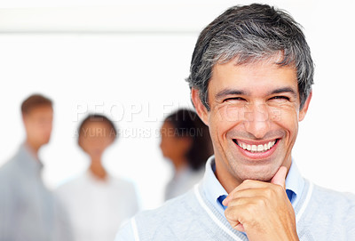 Buy stock photo Closeup portrait of smiling business man with colleagues in background