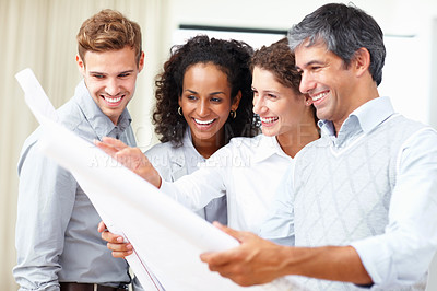 Buy stock photo Portrait of female leader with team discussing blueprint