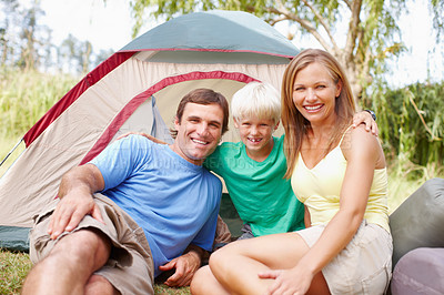 Buy stock photo Portrait, camping and parents with child in nature for adventure, holiday or weekend trip. Happy, bonding and boy kid with mom and dad by tent in outdoor woods for vacation together in New Zealand.