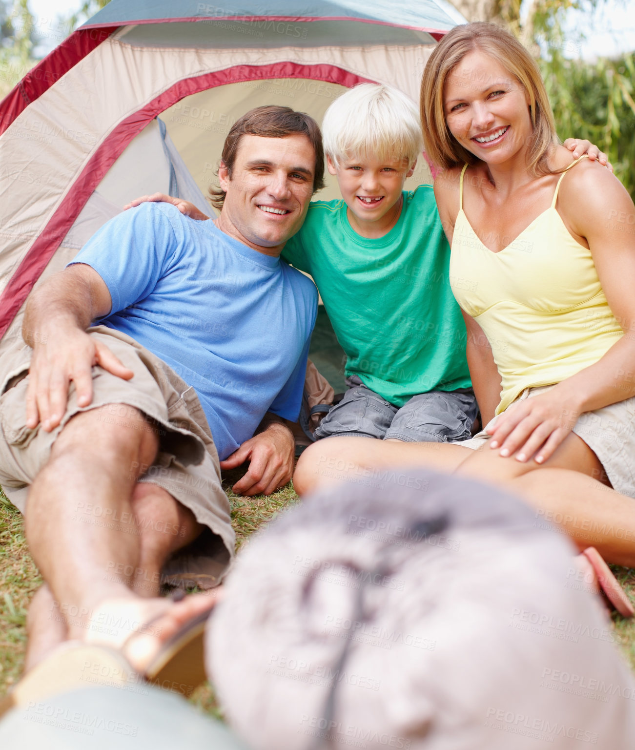 Buy stock photo Smile, camping and portrait of parents with child in nature for adventure, holiday or weekend trip. Happy, bonding and boy kid with mom and dad by tent in outdoor woods for vacation in New Zealand.