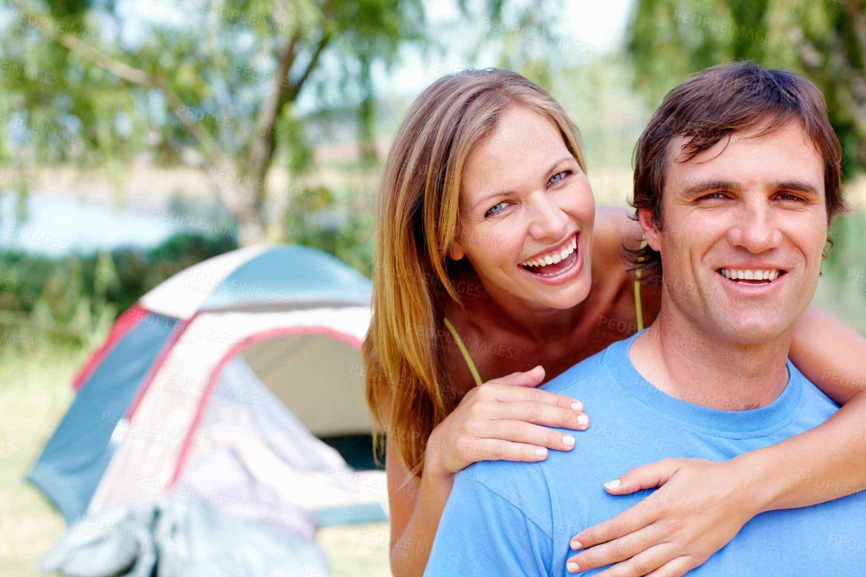 Buy stock photo Couple, portrait and camping in nature for vacation, relax and travel with tent and hug in California. People, bonding and happiness outdoor for holiday, hiking and adventure with smile by campsite 