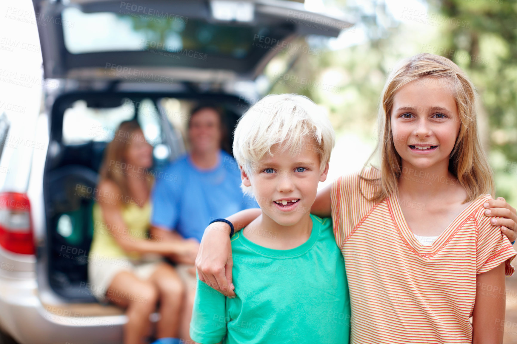 Buy stock photo Happy, boy and girl with portrait for camping outdoor with family for adventure and weekend trip in mother nature. Children, siblings and hug with smile in forest on summer holiday in wilderness.