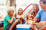 Family having breakfast while camping