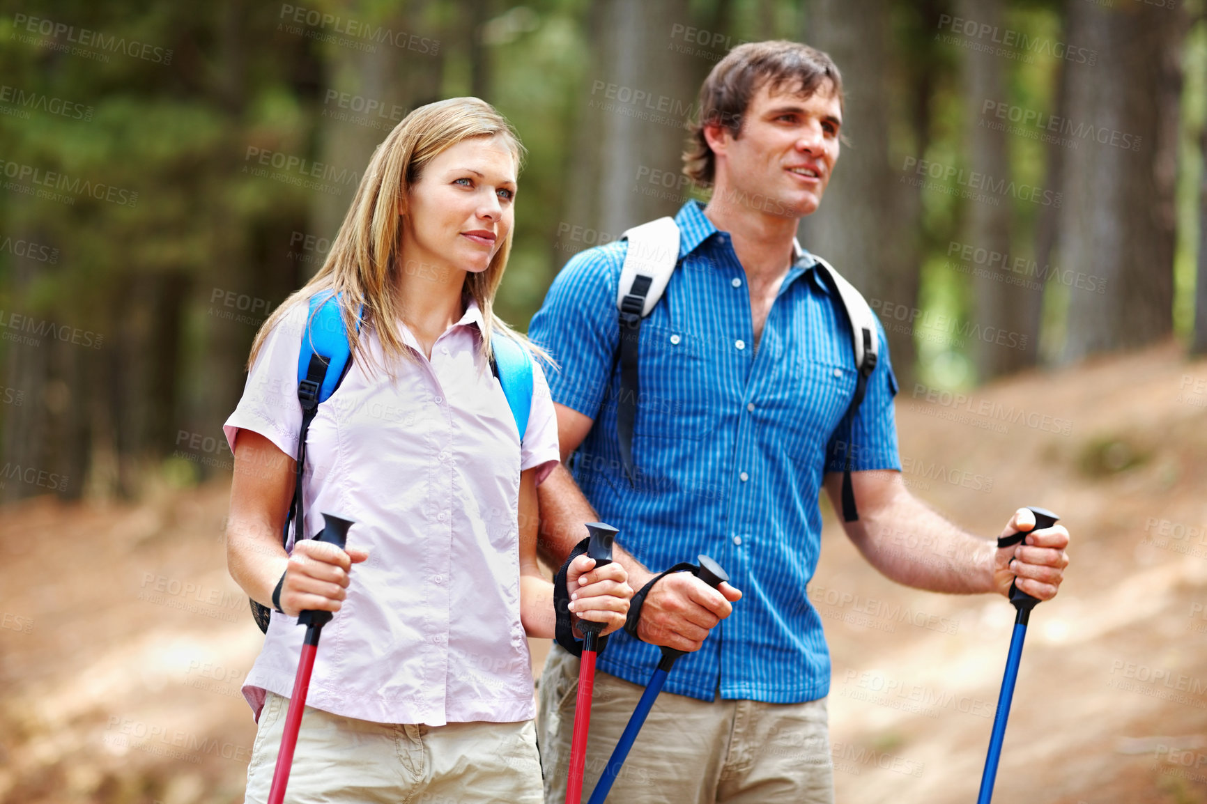 Buy stock photo Couple, hiking and gear with backpack, nature walk and travel for adventure in forest. Happy people, journey and backpacking for discovery, fitness and exploring for recreation, outdoor and trekking
