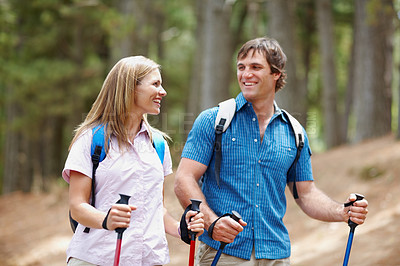 Buy stock photo Happy couple, hiking and gear with backpack, walk and nature for travel, adventure and bonding. People, journey and backpacking for discovery, fitness and exploring for recreation, outdoor and sports