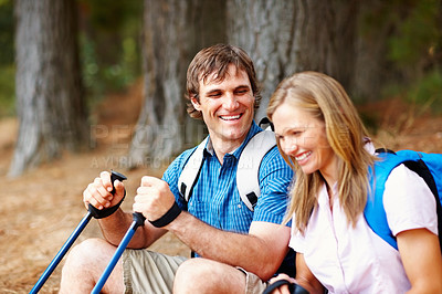 Buy stock photo Happy couple, hiking and outdoor with exploring, rest and nature for travel, adventure and bonding. People, laughing and countryside for discovery, fitness and backpack for recreation, gear or sports