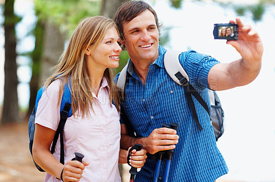 Buy stock photo Nature, couple and hiking with camera for selfie, photography or document memory on vacation in Sweden. Outdoor, woman and man as photographer with equipment, pov picture and bonding on adventure