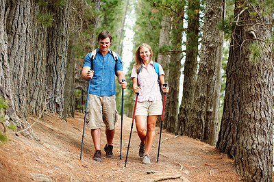 Buy stock photo Couple, hiking and gear with trekking, walk and nature for travel, adventure and bonding. Happy people, journey and countryside for discovery, fitness and exploring for recreation, outdoor and sports