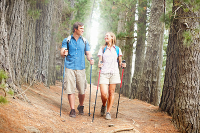 Buy stock photo Happy couple, hiking and gear with trekking, walk and nature for travel, adventure and bonding. People, journey and countryside for discovery, fitness and exploring for recreation, outdoor and peace