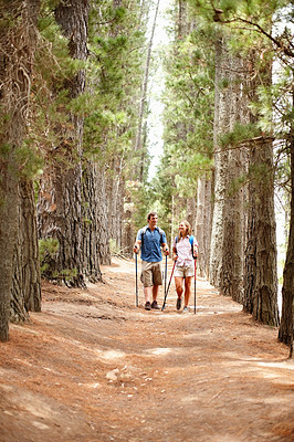 Buy stock photo Couple, hiking and gear with countryside, walk and nature for travel, adventure and forest. Happy people, journey and backpack for discovery, fitness and exploring for recreation, outdoor and sports