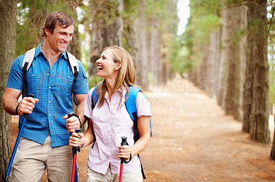 Buy stock photo Couple, hiking and gear with trekking, walk and bonding for travel, adventure and forest. Happy people, journey and backpacking for discovery, fitness and exploring for recreation, outdoor and sports