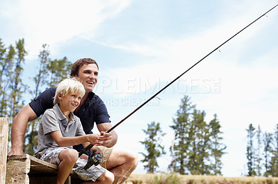 Buy stock photo Father, boy and fishing by lake for teaching, vacation and travel together in summer with gear on dock. Dad, son and catch fish in nature for learning, holiday and development while bonding with line