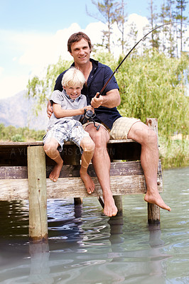 Buy stock photo Father, boy and fishing by lake for learning, vacation and travel together in summer with gear on dock. Dad, son and catch fish in nature for teaching, holiday and development while bonding with line