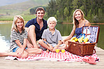 Picnicking lakeside with a smile 