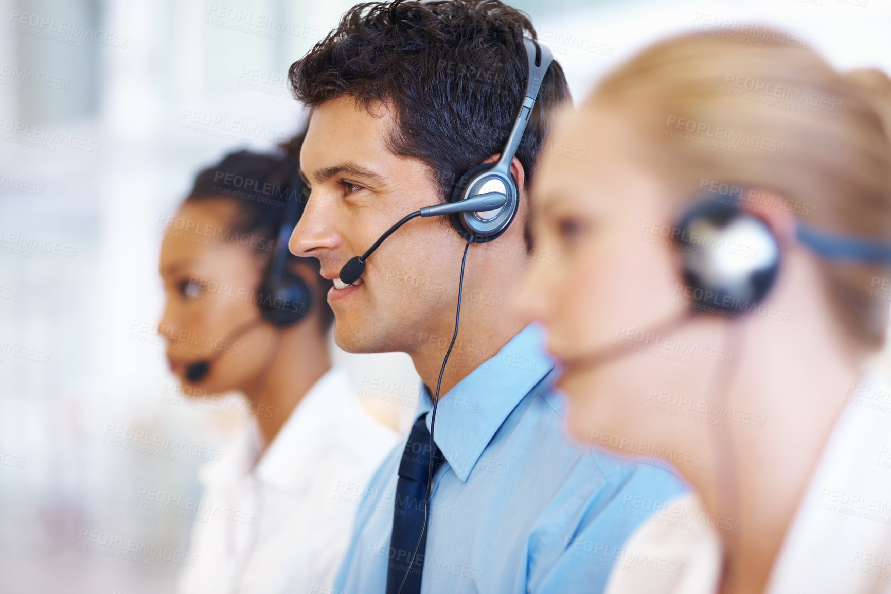Buy stock photo Portrait of male and female operators with headset at call center