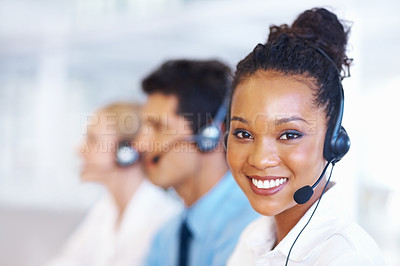 Buy stock photo Closeup of helpful African American female professional on call with colleagues