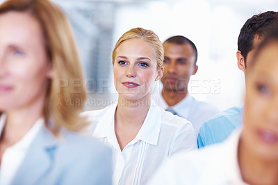 Buy stock photo Closeup of beautiful female executive in seminar with business people