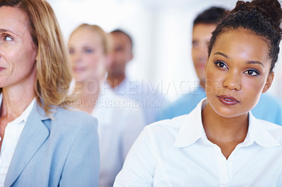Buy stock photo Closeup of attentive African American business woman with team in conference