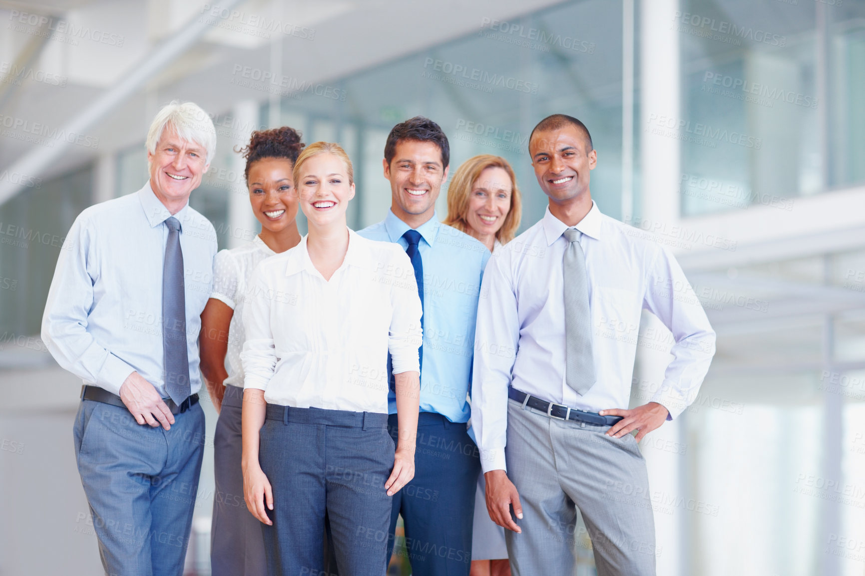 Buy stock photo Portrait of happy multi ethnic business group smiling together at office
