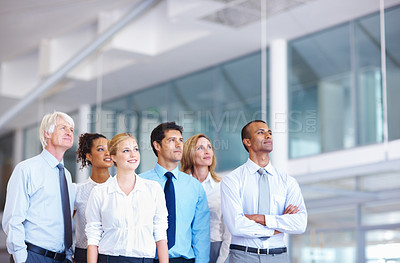 Buy stock photo Portrait of multi ethnic professionals looking away together at office