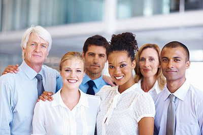 Buy stock photo Portrait of friendly multi racial business team smiling together at office