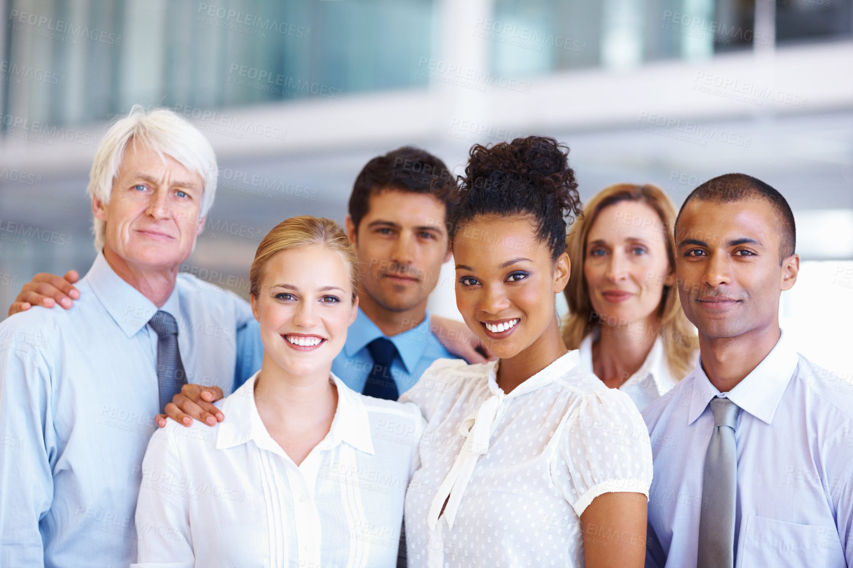 Buy stock photo Portrait of friendly multi racial business team smiling together at office
