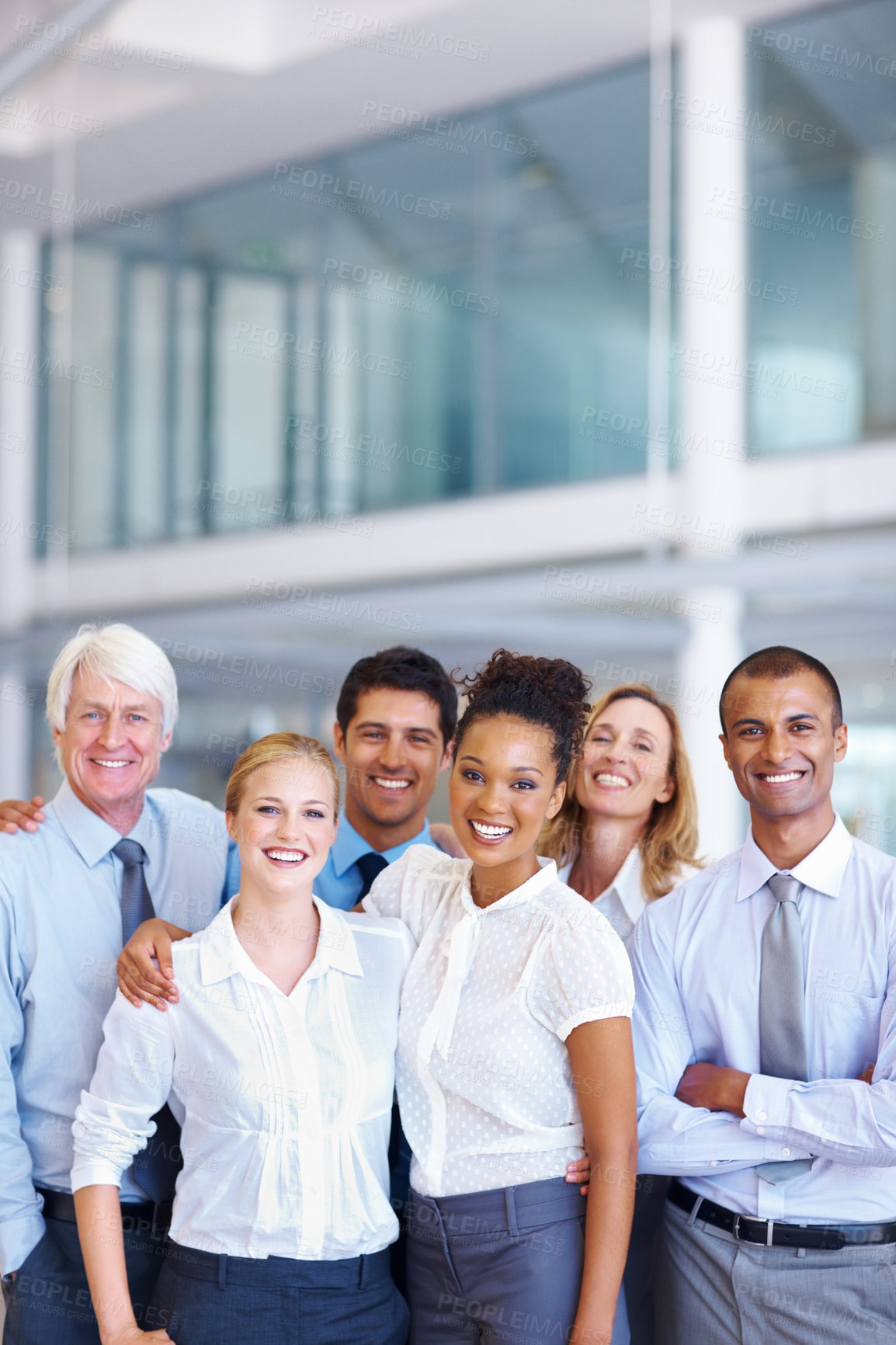 Buy stock photo Portrait of smiling business team standing together at office