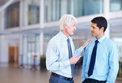 Buy stock photo Portrait of senior business man sharing his experience with junior executives at office