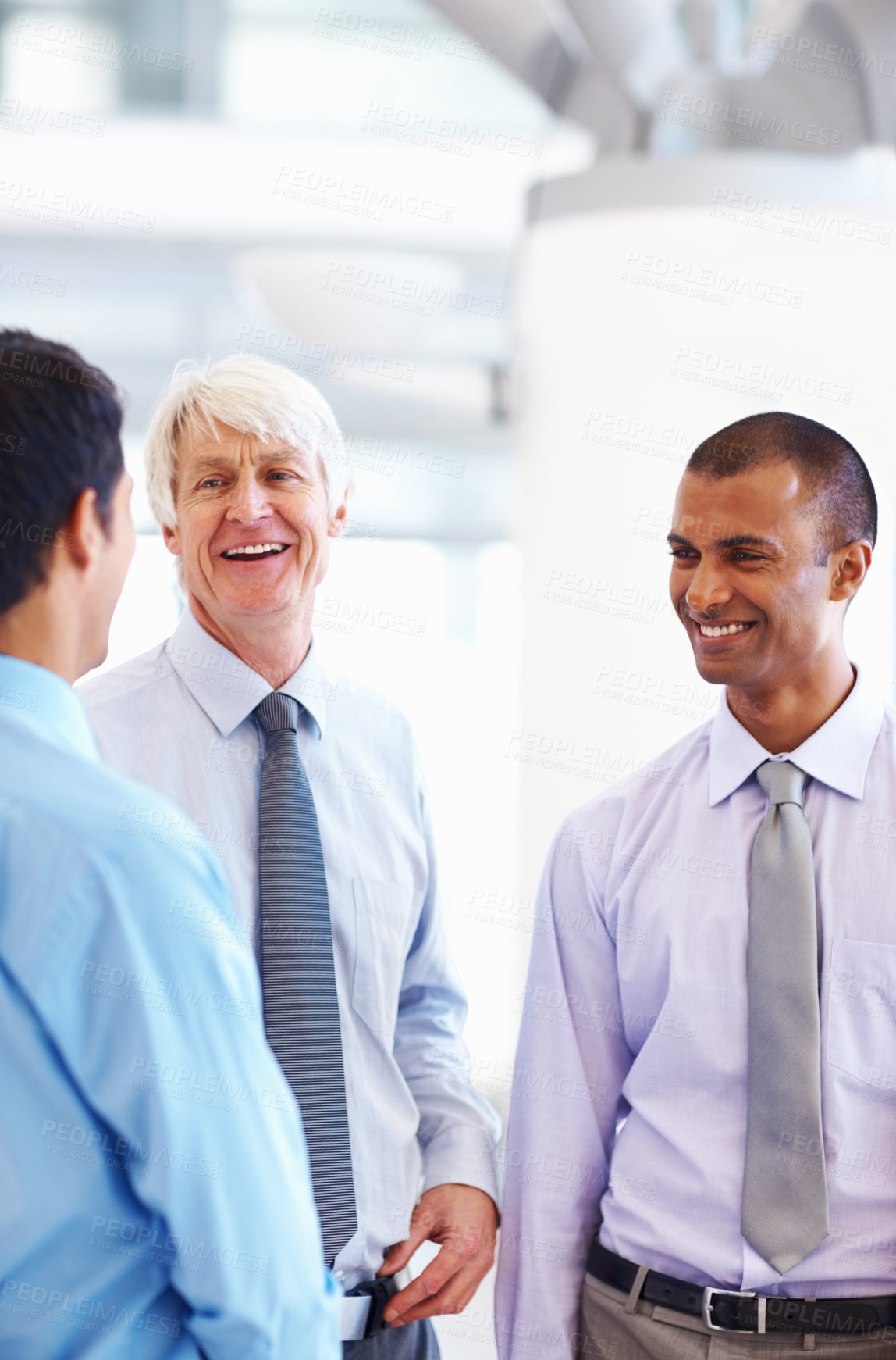 Buy stock photo Business people, laughing and talking together in office, partnership and consulting mentor in team. Employees, communication and advice for support in workplace, collaboration and lobby discussion