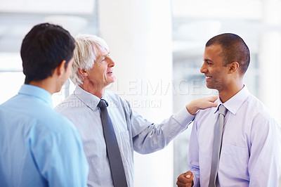 Buy stock photo Portrait of senior business man sharing his views with other executives