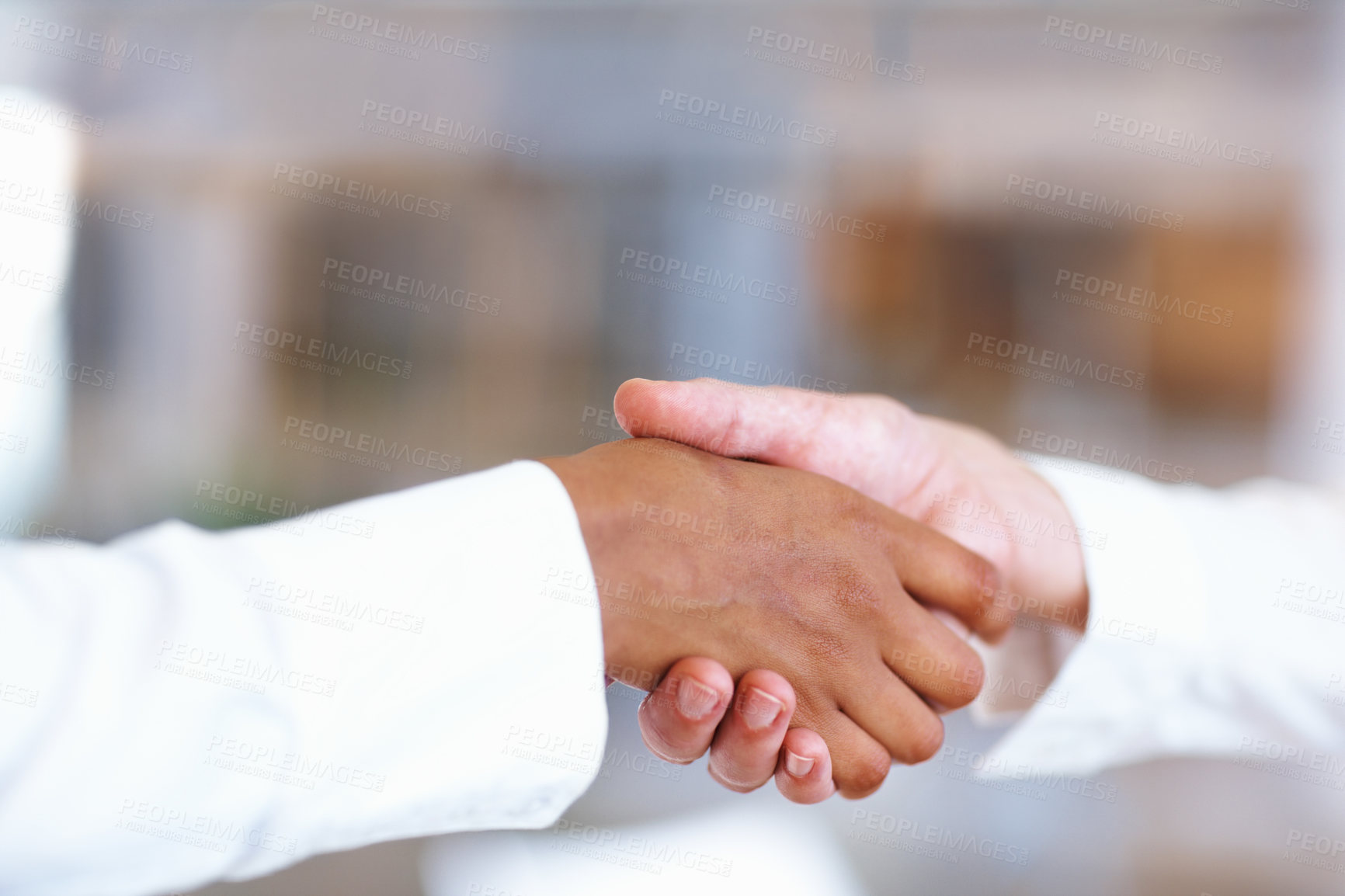 Buy stock photo Closeup of multiracial handshake between two business men