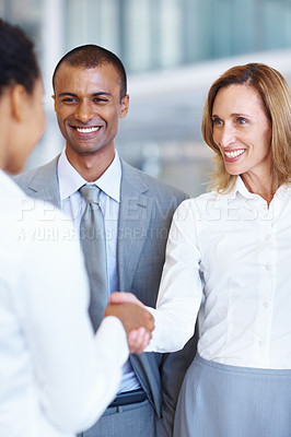 Buy stock photo Portrait of handshake between female executives with African American business man