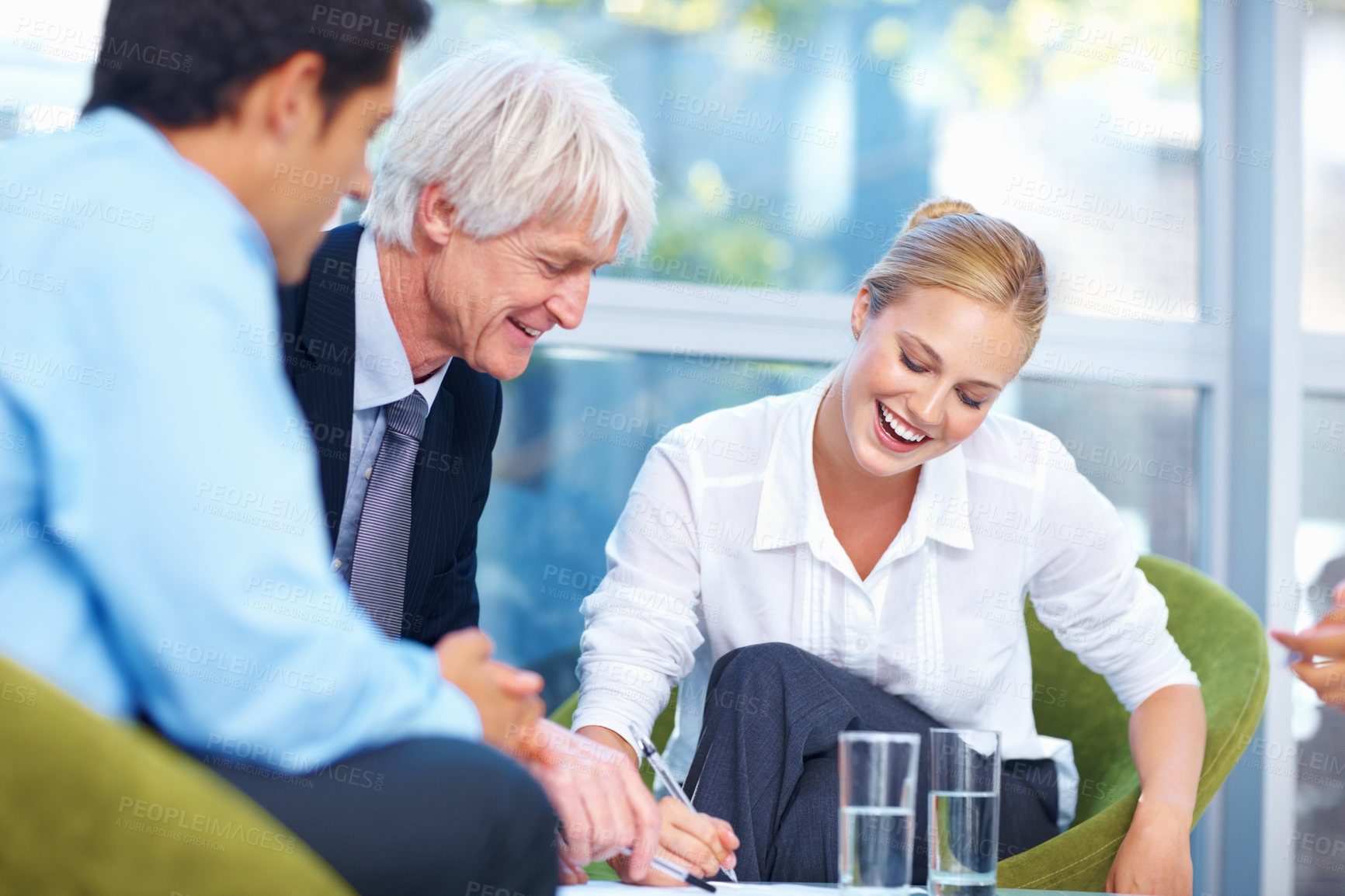 Buy stock photo Portrait of smiling business people having happy conversation at office