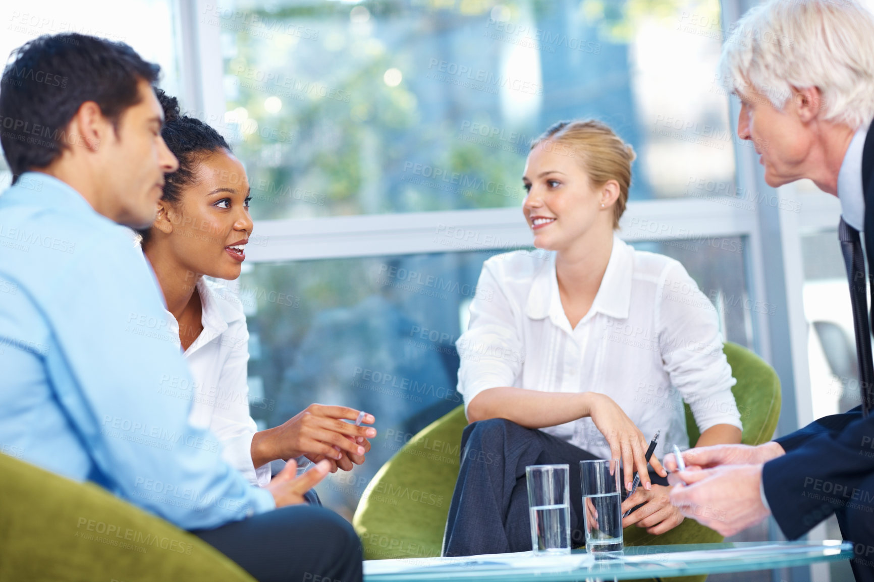 Buy stock photo Portrait of multi ethnic business team conversing with each other at office