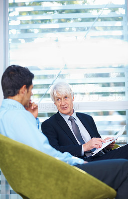Buy stock photo Portrait of male executives discussing together at meeting