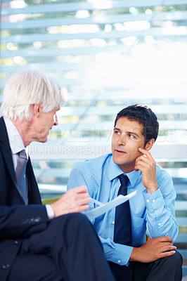 Buy stock photo Portrait of good looking business men in discussion about contract at office