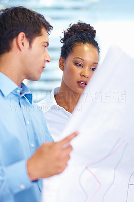 Buy stock photo Portrait of multi racial architects discussing while looking at blueprints