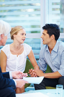 Buy stock photo Portrait of young couple meeting financial adviser for future planning