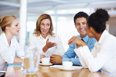Buy stock photo Portrait of mature female leader with colleagues at seminar room