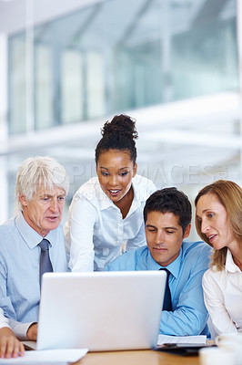 Buy stock photo Portrait of confident multi racial executives working together on laptop
